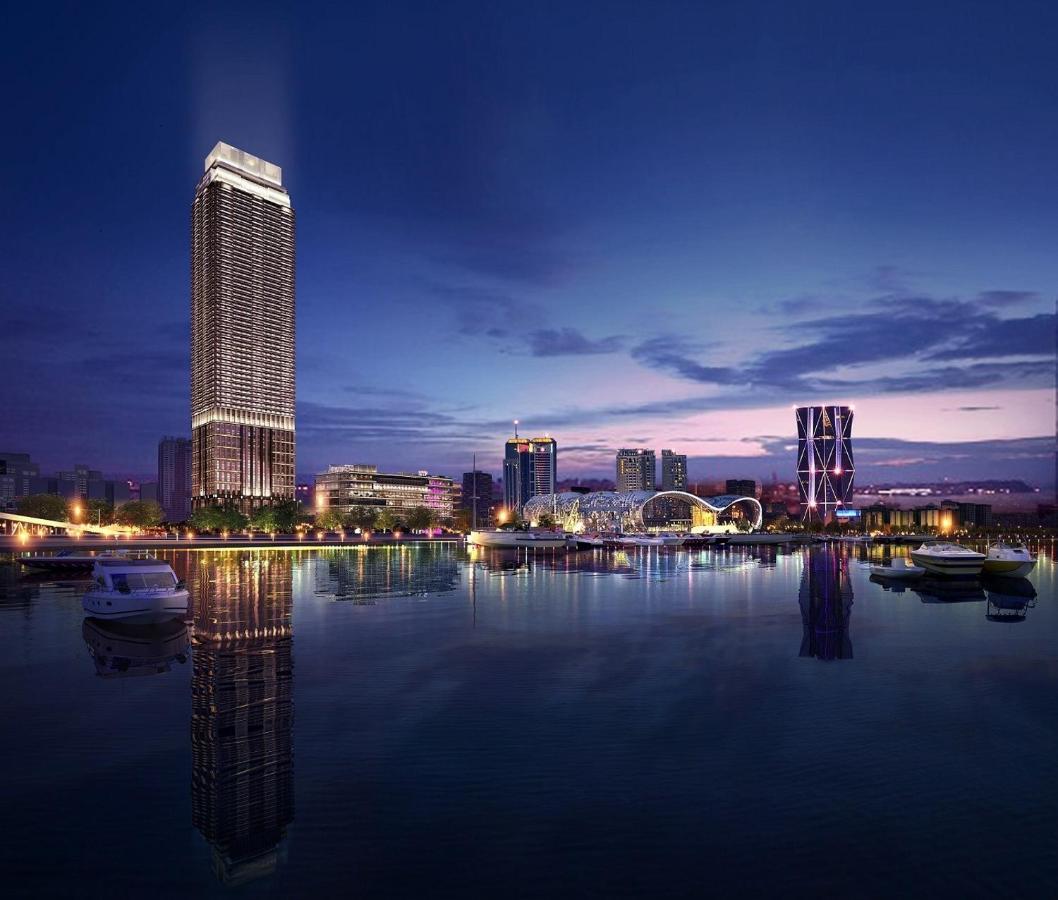 Intercontinental Kaohsiung By Ihg Hotel Exterior photo The complex at night